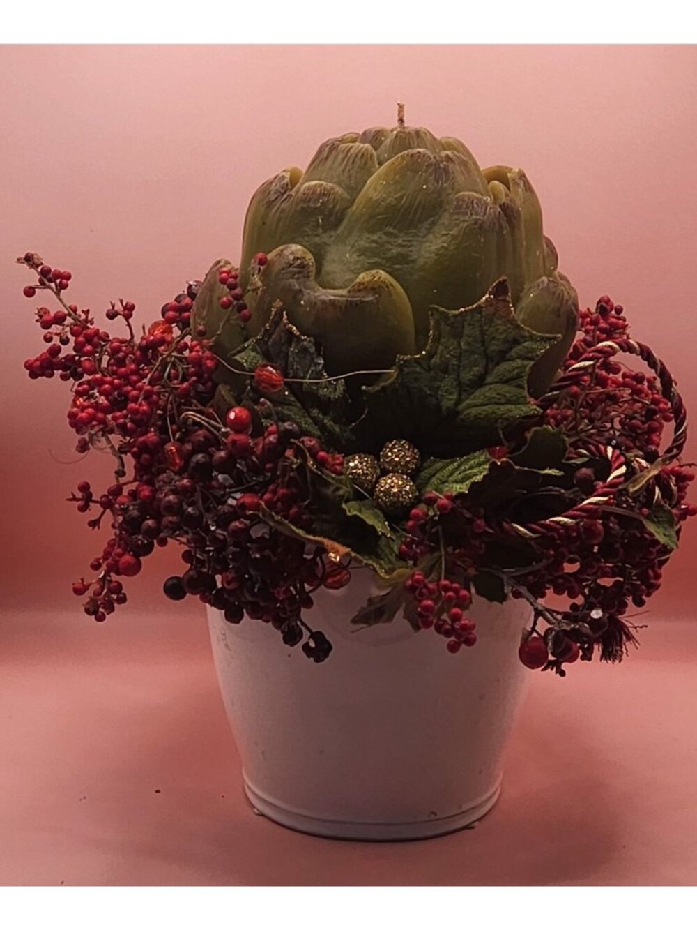 artichoke  is a decorative pillar candle  arrangement